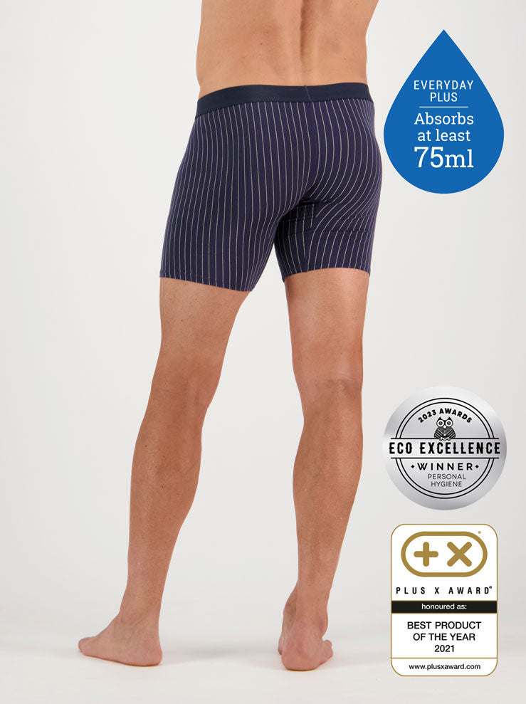 Confitex for Men leakproof long trunks for moderate bladder leakage in navy blue with a grey pinstripe - Back View.